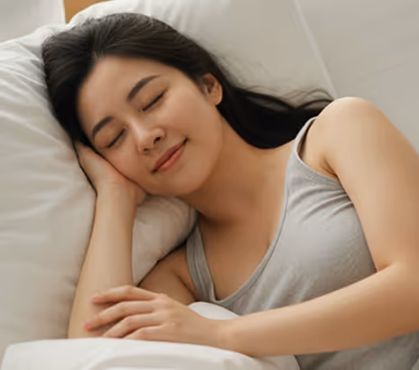 A couple lying down in bed